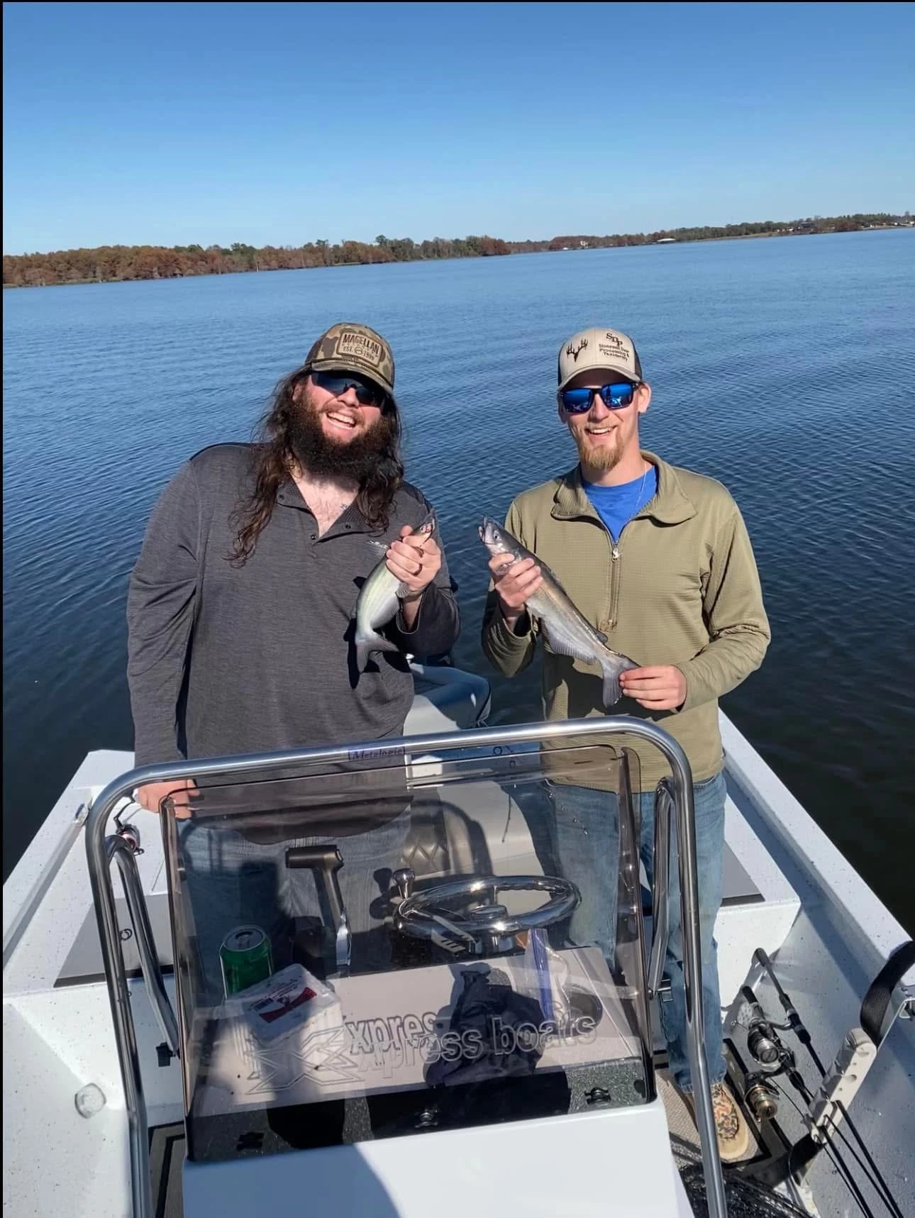 Mike and Zach holding fish
